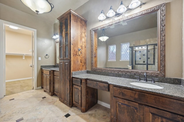 bathroom featuring vanity and walk in shower