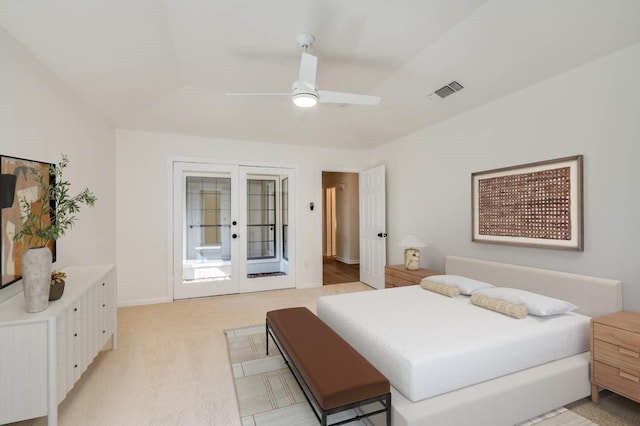 bedroom with french doors, access to exterior, ceiling fan, and light colored carpet