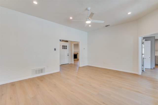 interior space featuring ceiling fan and light wood-type flooring