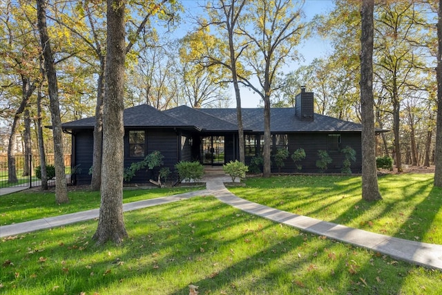 view of front of home with a front yard