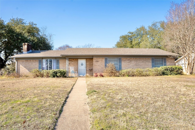 single story home with a front yard