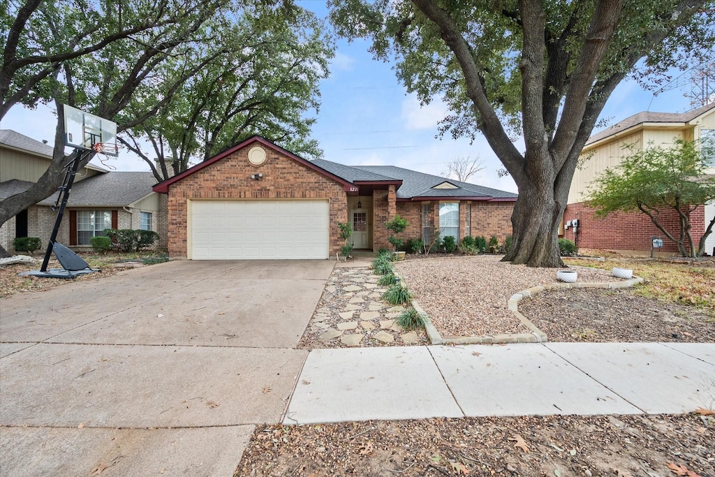 single story home with a garage