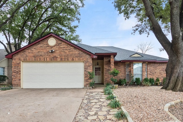 ranch-style house featuring a garage