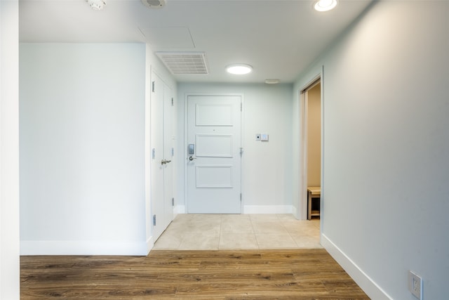 hallway featuring light wood-type flooring