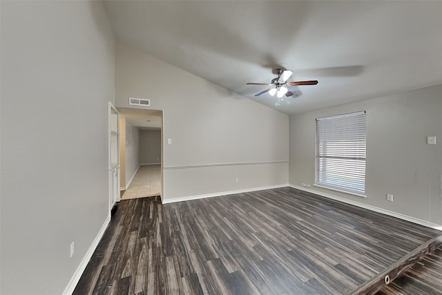 unfurnished room with dark hardwood / wood-style floors, high vaulted ceiling, and ceiling fan