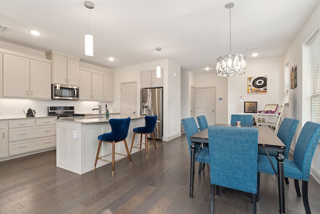 dining room featuring dark wood-type flooring