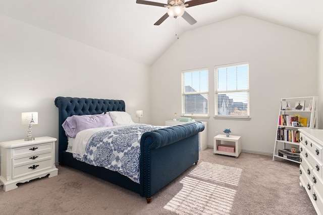 bedroom with carpet floors, ceiling fan, and lofted ceiling