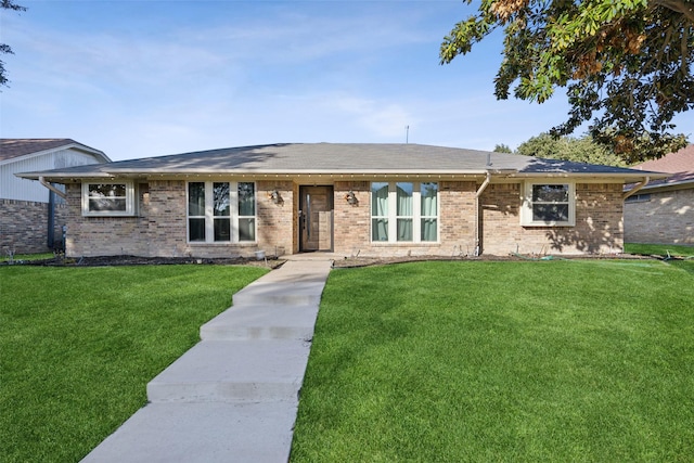 ranch-style house with a front lawn