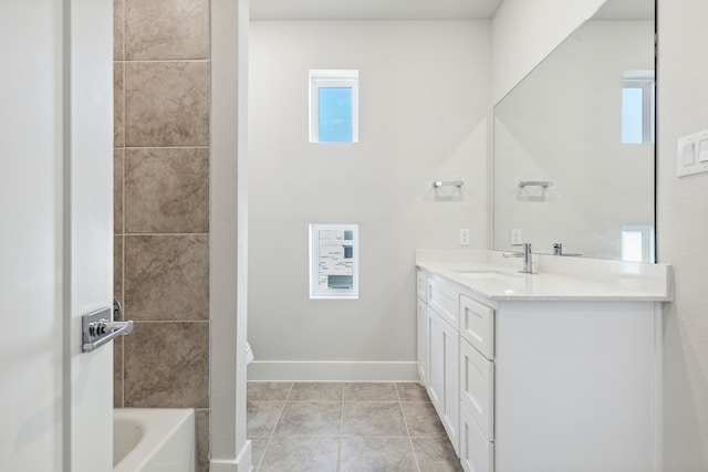 bathroom featuring tile patterned floors and vanity