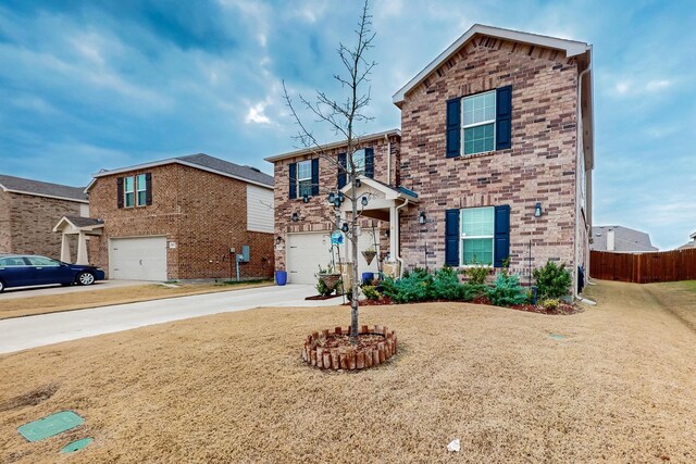 view of front of property with central AC unit, a garage, and a front yard