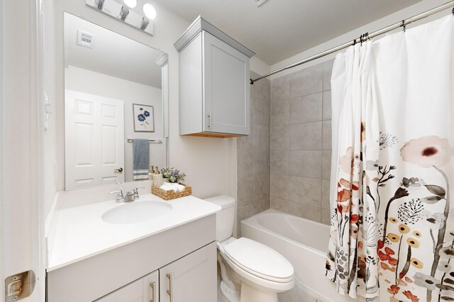 full bath with toilet, shower / bathtub combination with curtain, visible vents, and vanity