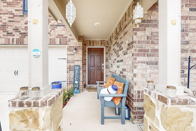 doorway to property featuring brick siding