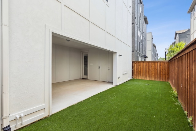 view of yard with a patio area