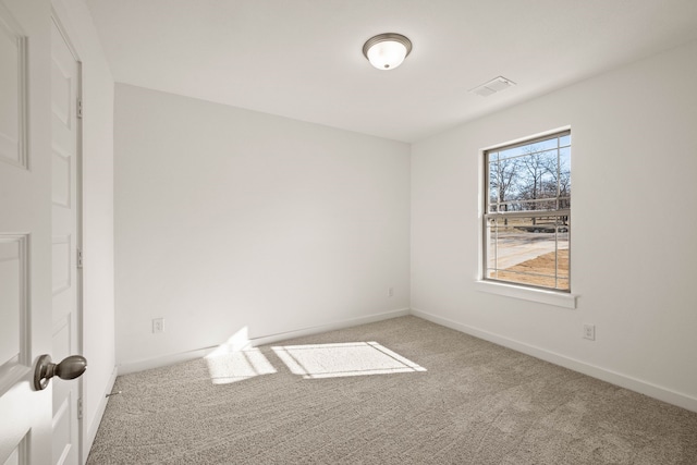 spare room with carpet flooring