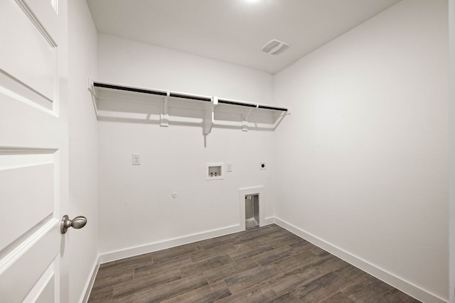 washroom with hookup for a gas dryer, hookup for a washing machine, dark hardwood / wood-style floors, and hookup for an electric dryer