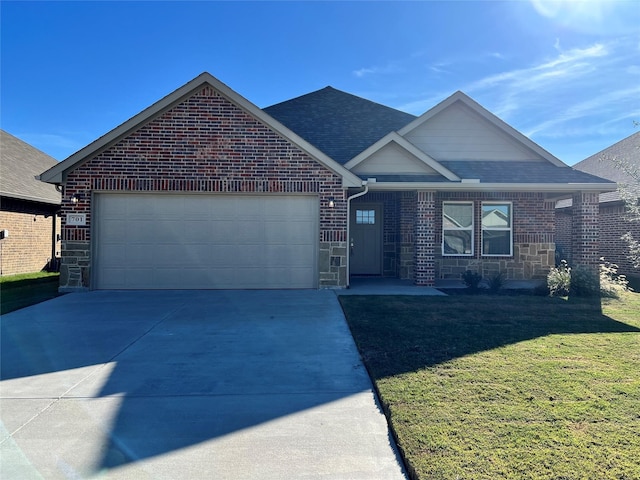 view of front of property with a garage and a front yard