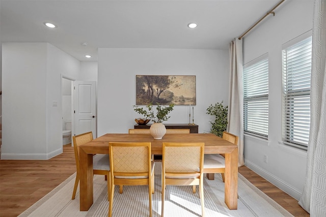 dining area with light hardwood / wood-style floors