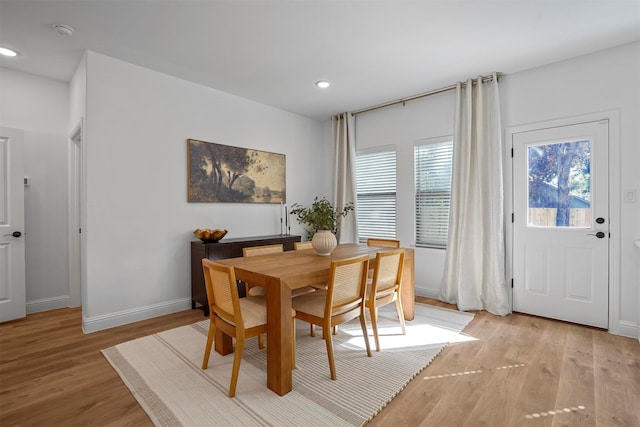 dining room with light hardwood / wood-style floors