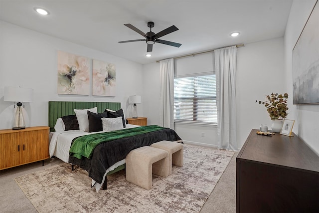 carpeted bedroom featuring ceiling fan