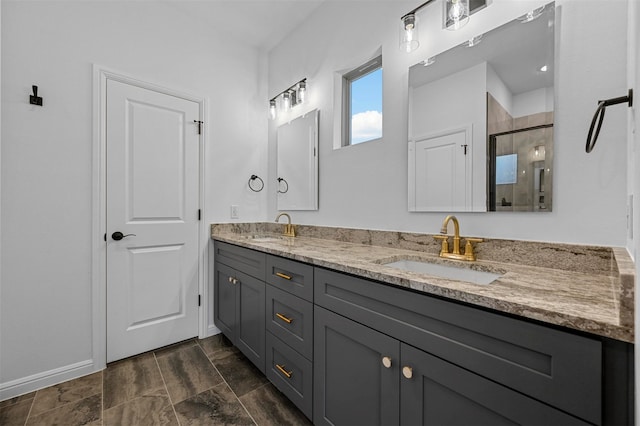 bathroom with an enclosed shower and vanity