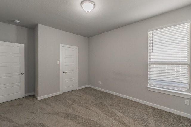 empty room with carpet floors