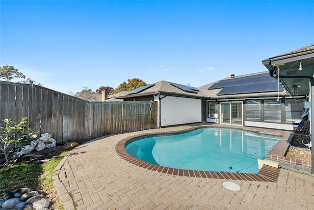 view of pool with a patio