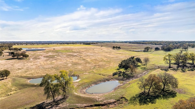 bird's eye view featuring a rural view and a water view