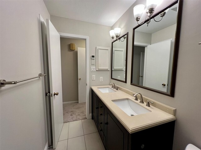 bathroom featuring tile patterned floors and vanity