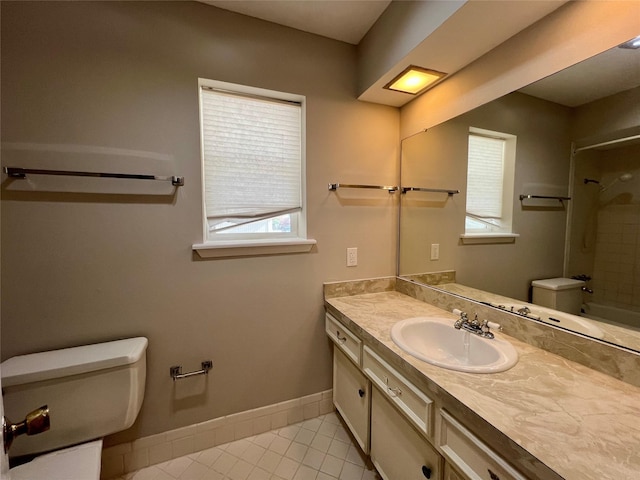 full bathroom featuring toilet, vanity, shower / washtub combination, and tile patterned flooring