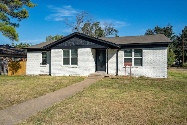 ranch-style house with a front yard