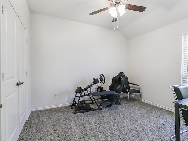 exercise area with vaulted ceiling, ceiling fan, and carpet