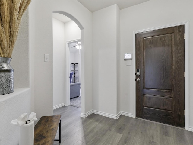 entryway featuring hardwood / wood-style flooring and ceiling fan