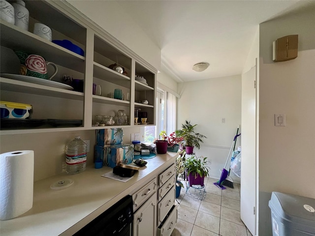 kitchen with light tile patterned floors