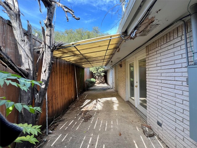 view of patio / terrace featuring a carport