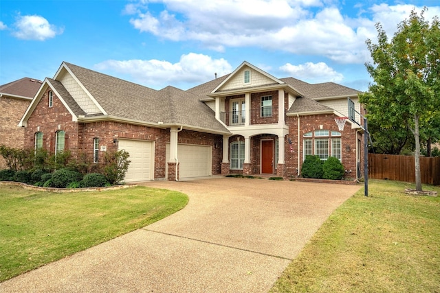 view of front of house with a garage and a front yard