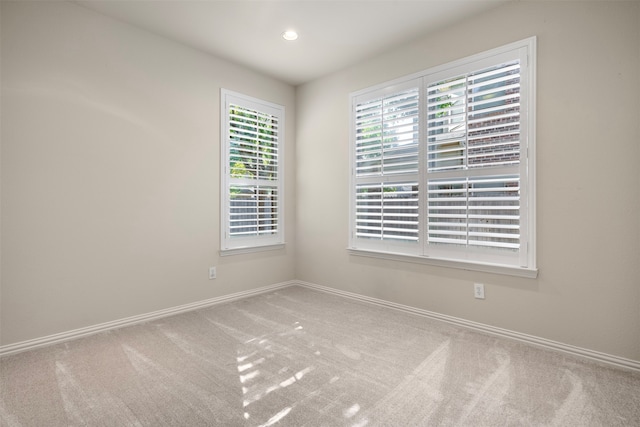 view of carpeted spare room