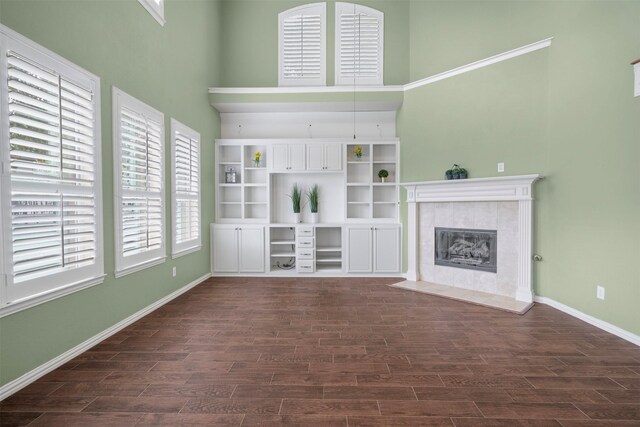 kitchen with white cabinetry, sink, a center island, tasteful backsplash, and appliances with stainless steel finishes