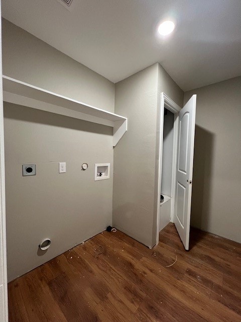 clothes washing area featuring hookup for a washing machine, dark wood-type flooring, gas dryer hookup, and electric dryer hookup