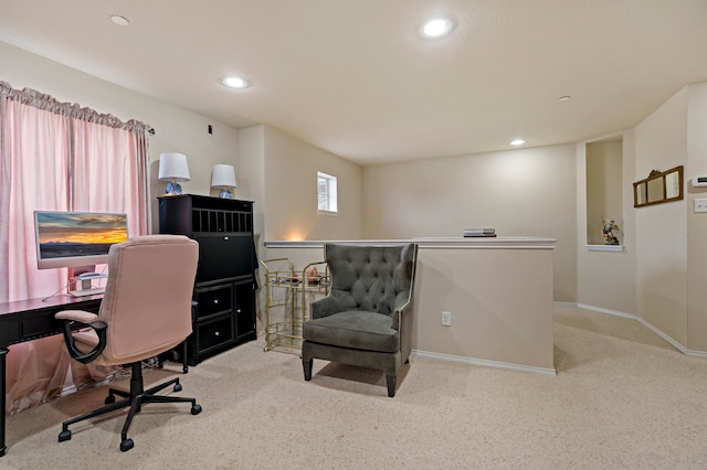 office area with light colored carpet