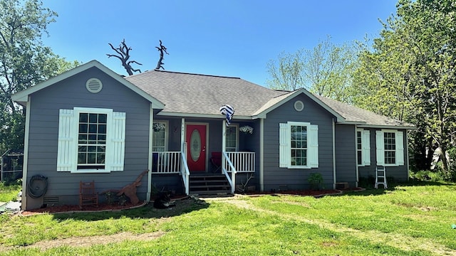 view of front of home featuring a porch and a front lawn