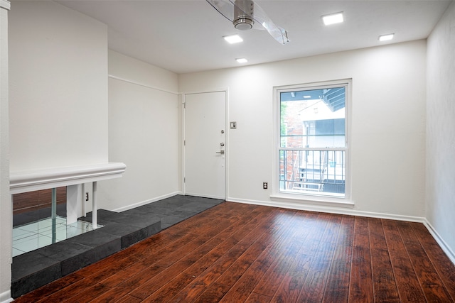 foyer with dark wood-type flooring