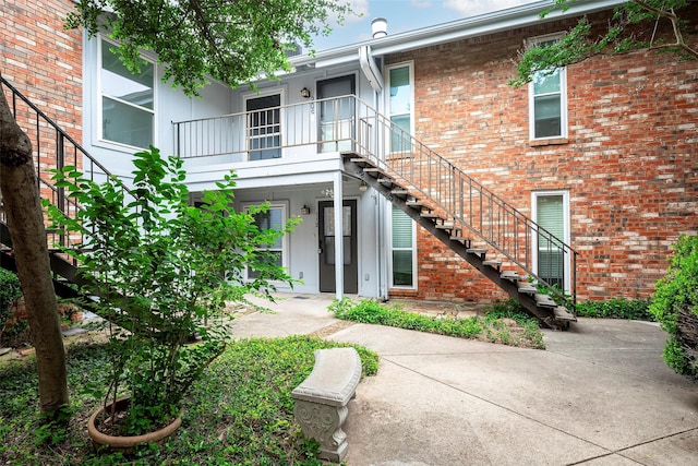 rear view of property with a patio area