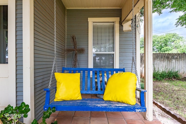 view of patio featuring fence