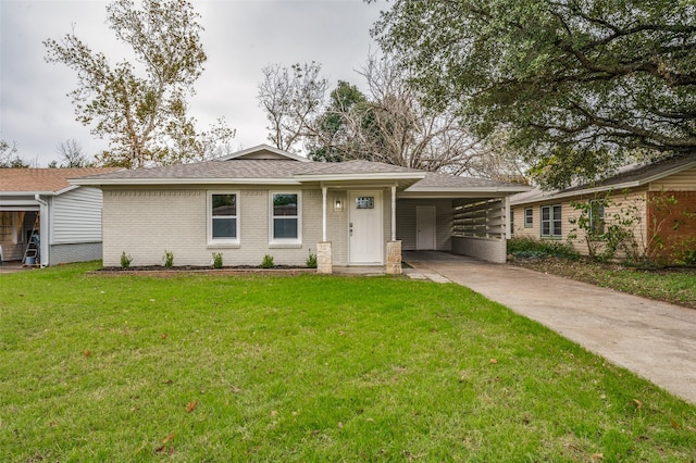 view of front facade featuring a front lawn and a carport