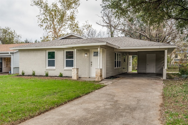 view of front facade featuring a front lawn and a carport