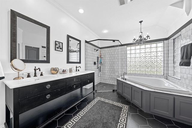 bathroom featuring vanity, crown molding, tile patterned flooring, separate shower and tub, and a chandelier