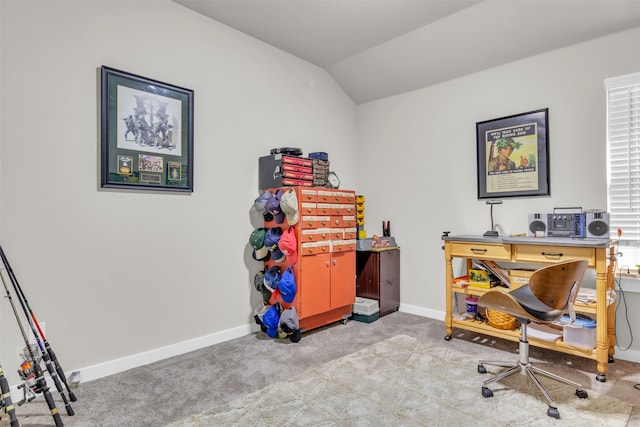 office area with light carpet and vaulted ceiling