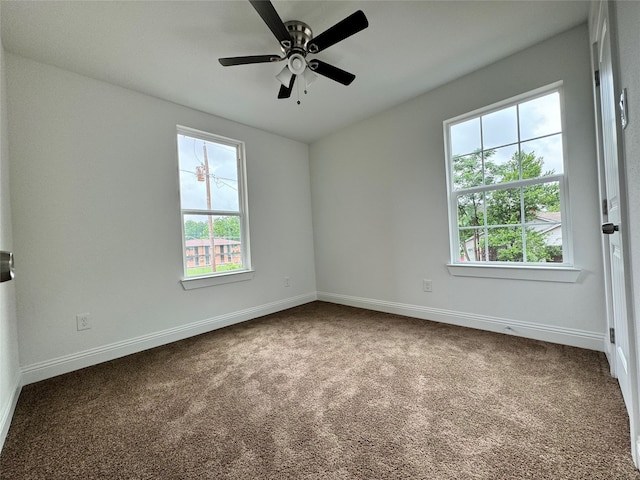 unfurnished room featuring carpet and ceiling fan