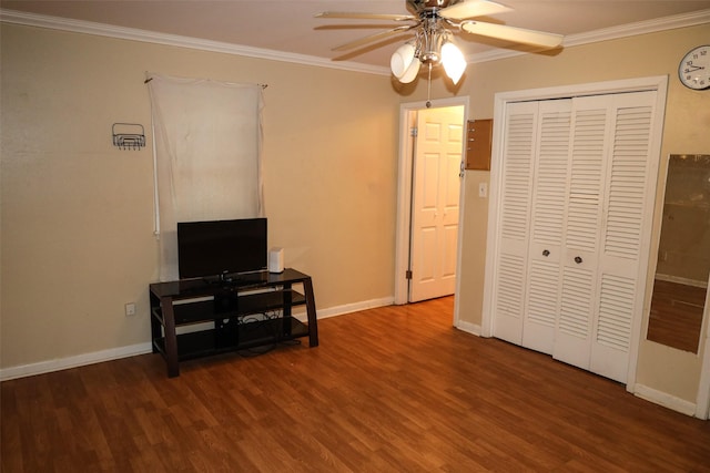 bedroom featuring ceiling fan, dark hardwood / wood-style flooring, and ornamental molding