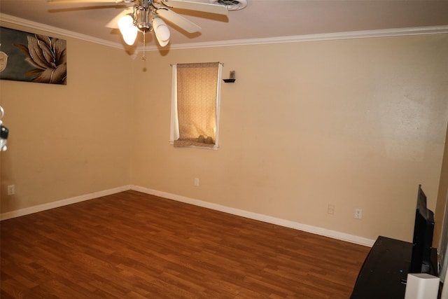 unfurnished room featuring ceiling fan, dark hardwood / wood-style flooring, and ornamental molding